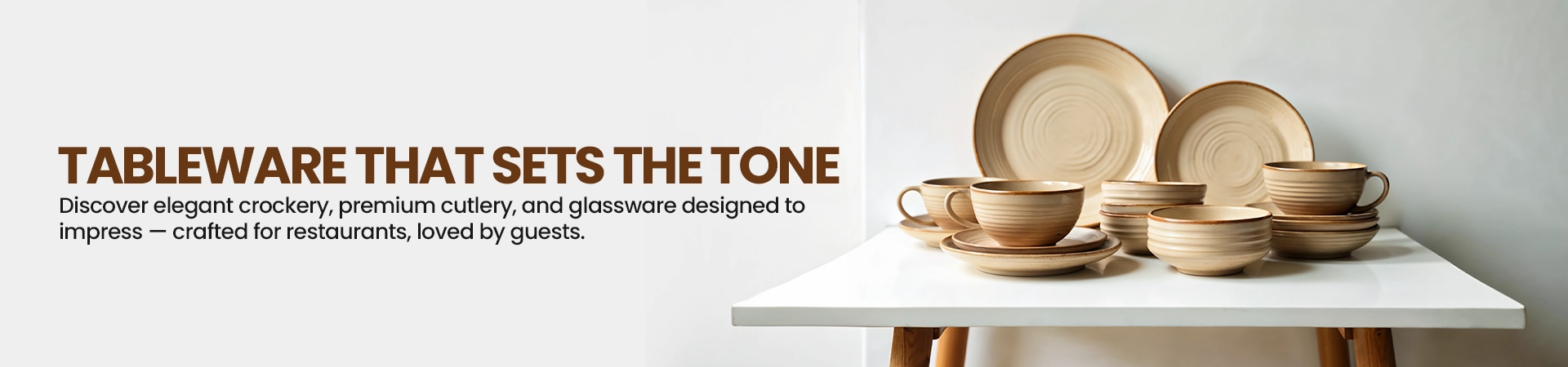 Banner showing elegant tableware set including crockery, cutlery, and glassware, designed to impress guests in restaurants and homes.